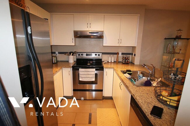 Building Photo - Glenmore 1 Bedroom Apartment For Rent 103-3033 Terravista Place Port Moody: VADAPM.com