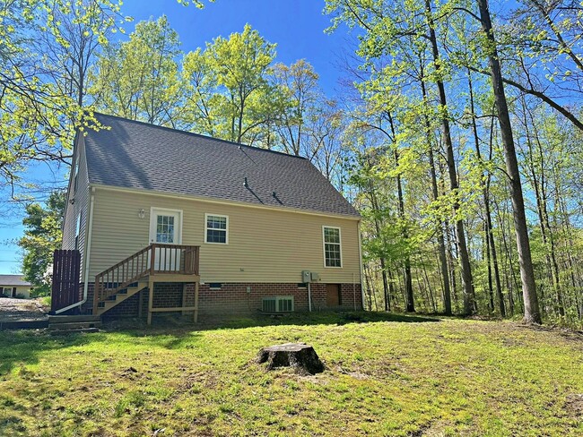 Building Photo - Cape Cod on Large Wooded Lot