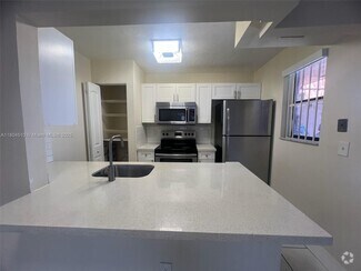 Building Photo - 6560 W 27th Ct