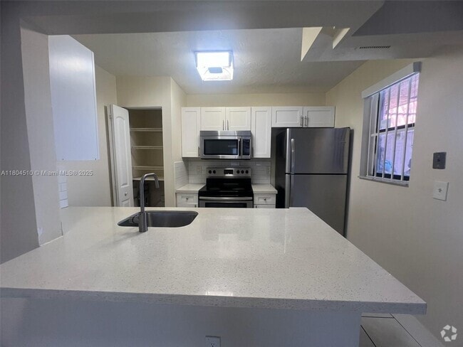 Building Photo - 6560 W 27th Ct