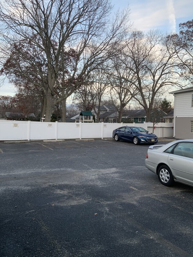 Designated apartment parking - 1225 River Ave