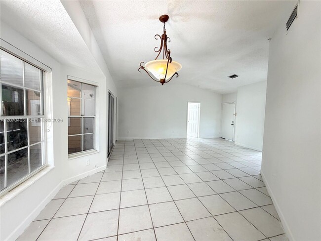 Building Photo - 9850 W Heather Ln