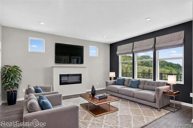 Foto del edificio - Modern 3-Bedroom Condo in Lake Orion Near I-75