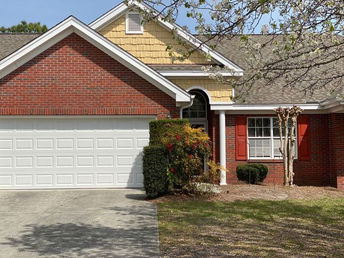 Primary Photo - Merestone 1 level brick patio home. 2 Car ...