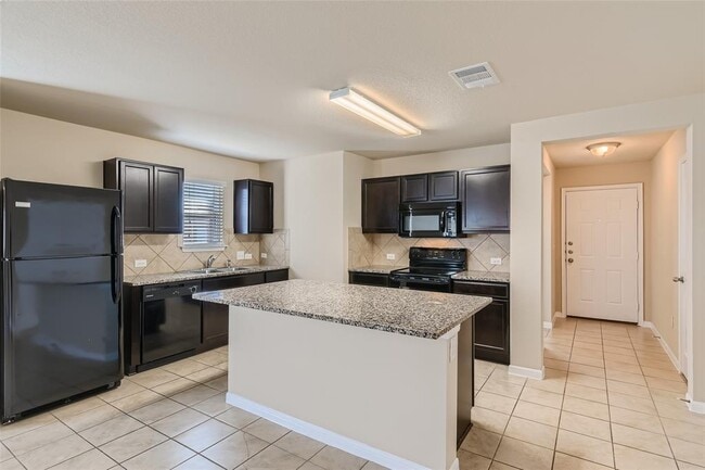 Building Photo - 5704 Montrelia Dr