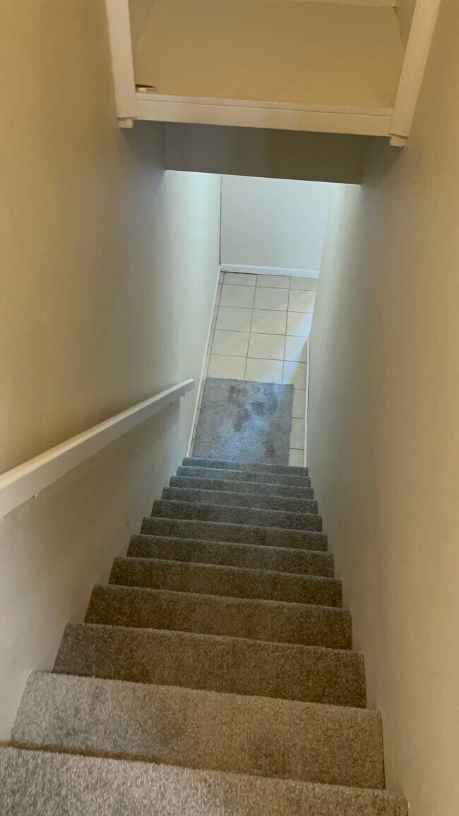 Stars to laundry room and first floor - 7958 Langdon St
