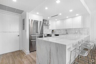 Building Photo - 5701 Collins Ave