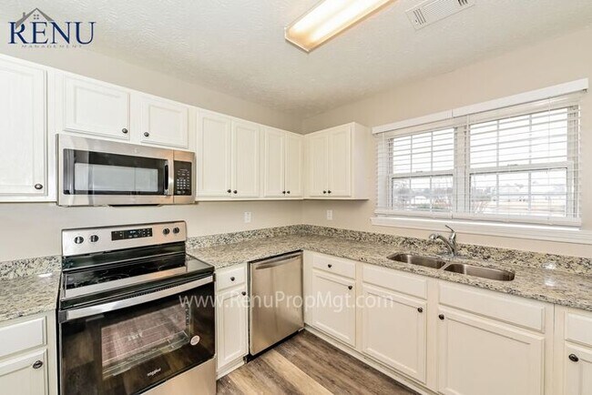 Building Photo - Now available 4 bedrooms 2.5 baths