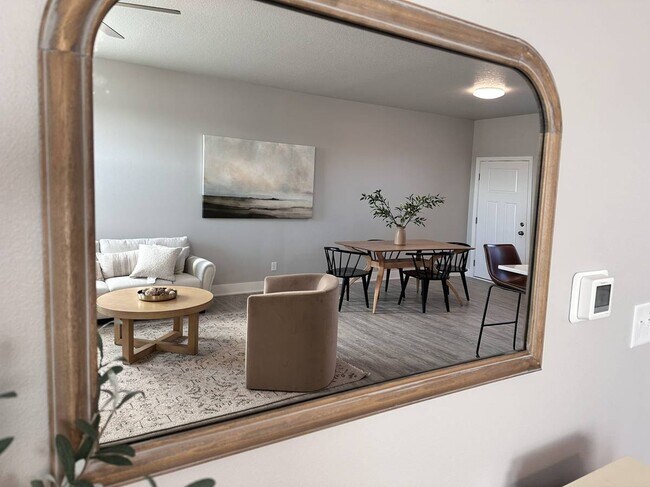 Open floor living area - 214 NW Common Pl