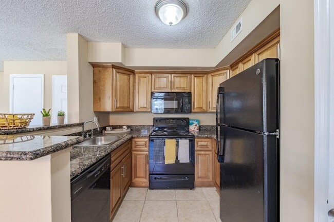 Building Photo - Royal St. George at the Villages Apartment Homes