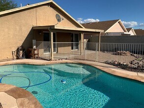 Building Photo - 8824 S Desert Rainbow Dr