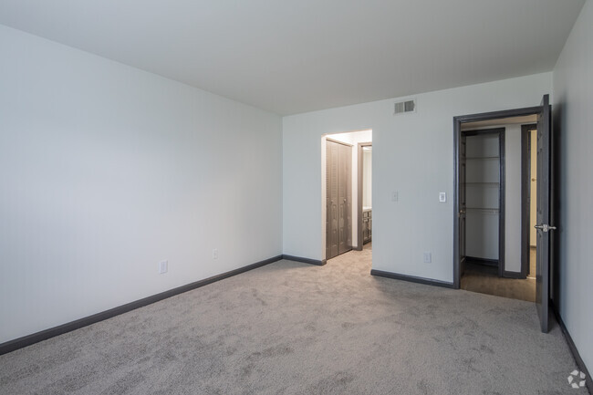 2BR, 2BA - 1,200SF - Primary Bedroom - Equinox at Midtown