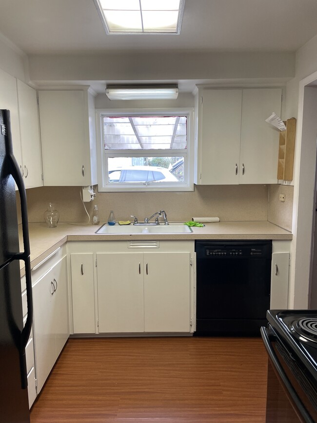 Kitchen with refrigerator, dishwasher and stove - 12409 2nd Ave S