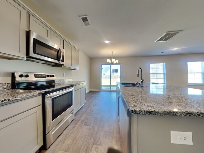 Building Photo - 409 Red Poll Wy