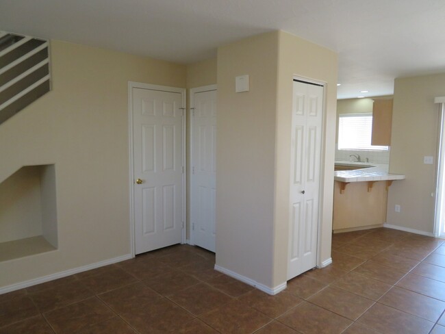 doors to closet and 1/2 bathroom - 700 Aztec Cir