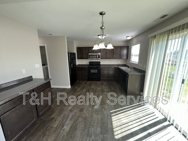 Building Photo - 8117 Whistlewood Dr