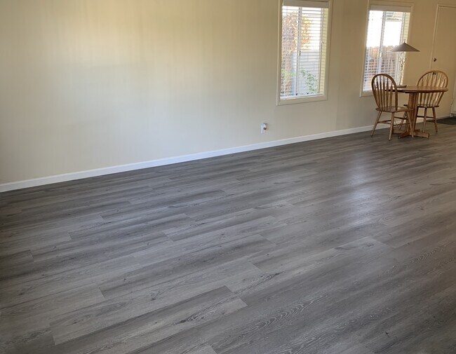 Living Room with Dining Area - 7020 Stansbury Ave