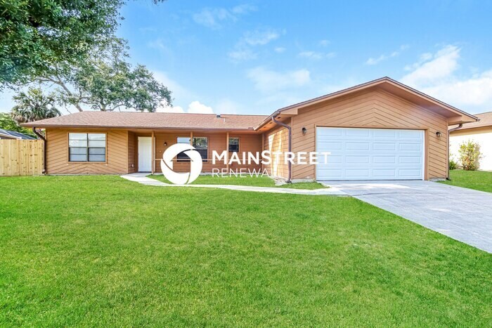 Foto principal - 3 Bedroom Pet-Friendly Home in Palm Bay, F...