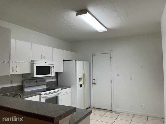 Building Photo - 2 br, 2.5 bath House - 7665 Tamarac Island...