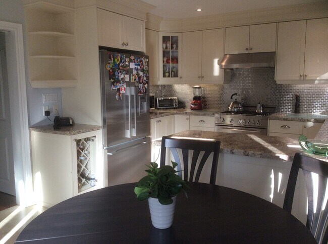 Custom kitchen with granite counters and stainless steel built in appliances - 29 Lois Av