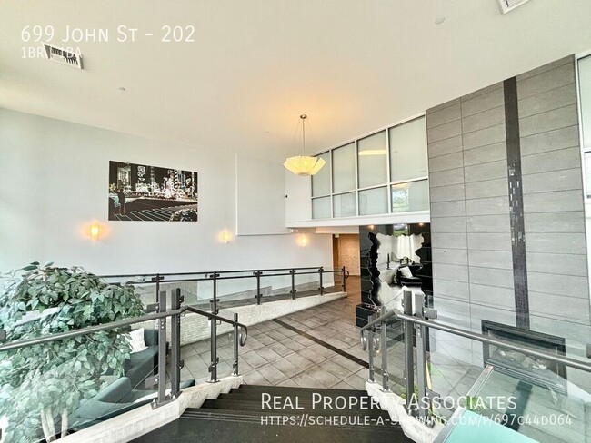 Building Photo - Urban Retreat: Furnished 1-Bed Corner Unit...