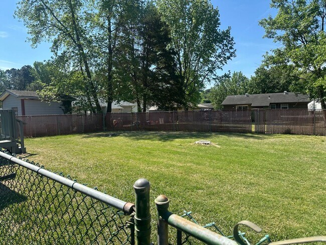 Building Photo - Coming Soon! Durham Gem with Fenced Yard & Deck