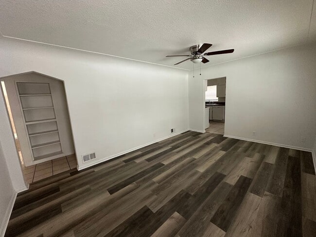 Building Photo - Spacious 4 Bedroom Home | 2 Living Rooms | Large Fenced Yard | 1,700+ Sq Ft