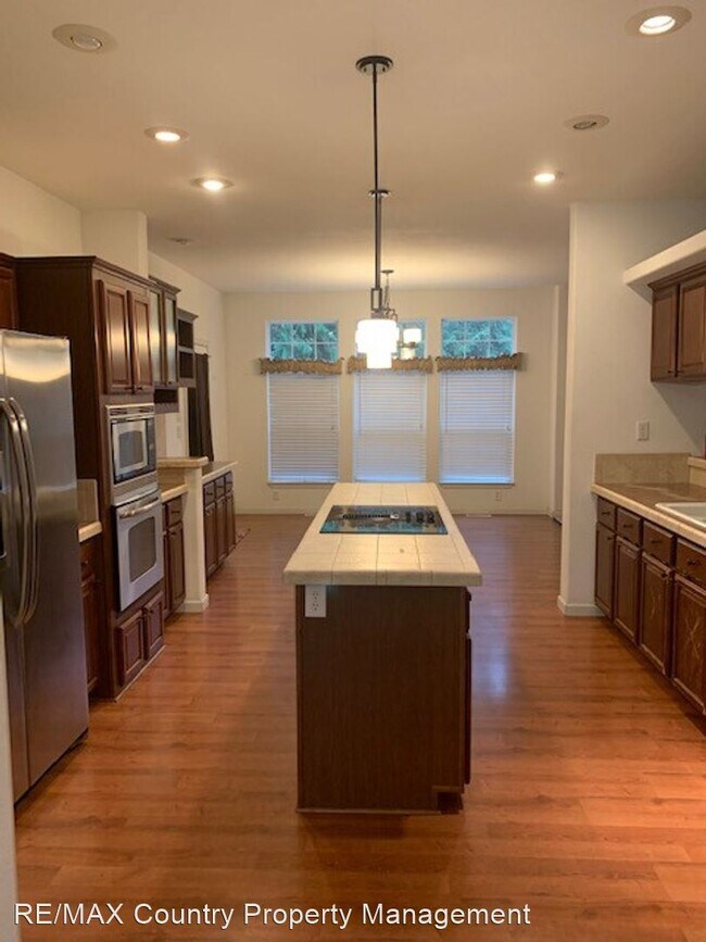 Building Photo - 4 br, 3 bath House - 7412 Harts Lake Rd S