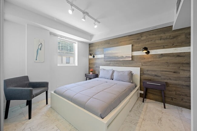 Bedroom includes a Queen Size bed - 100 Collins Ave