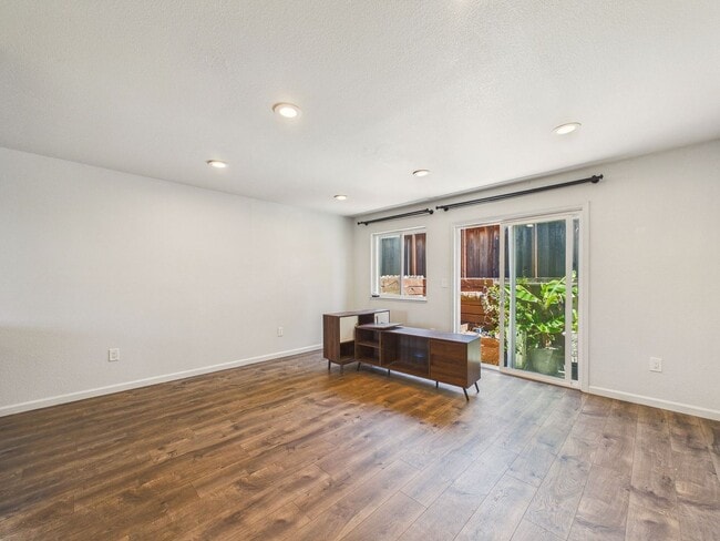 Building Photo - Updated 2 Bed / 1.5 Bath Townhome – In-Unit Washer & Dryer + Garage Parking – $2,800/month