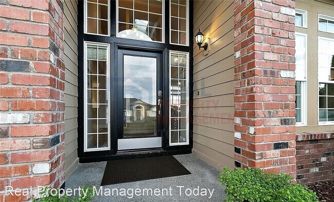 Building Photo - 4 br, 2.5 bath House - 9916 181st Ave Ct. E