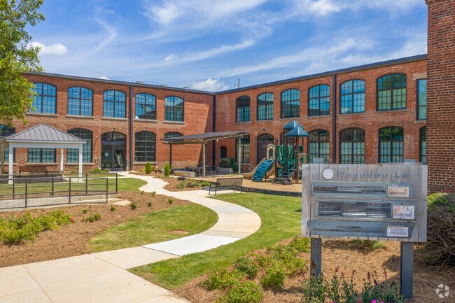 Courtyard w/ Lounge Seating - Wagon Works Apartments