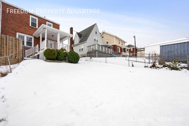 Building Photo - 2 Amherst Ave - West View
