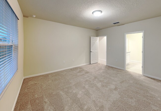 Building Photo - 4/2 Single Family Home W/ Fenced In Backyard