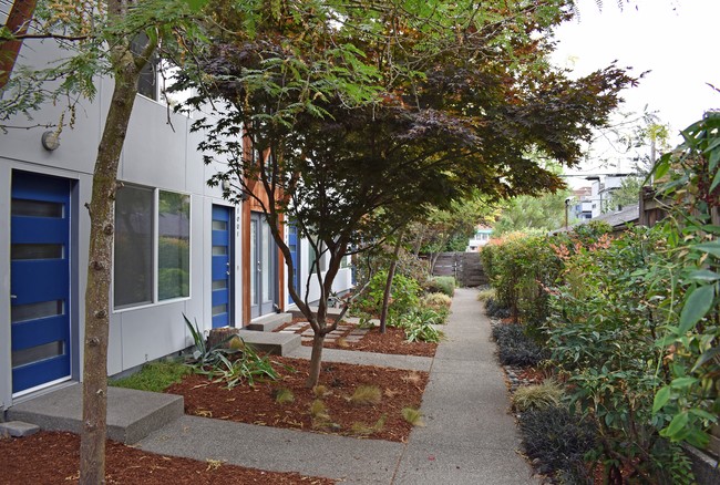 Courtyard - Private Entrances - Bleu Apartments