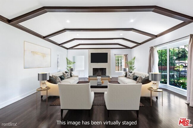 Foto del edificio - 4 br, 2.5 bath House - 11128 Montana Ave