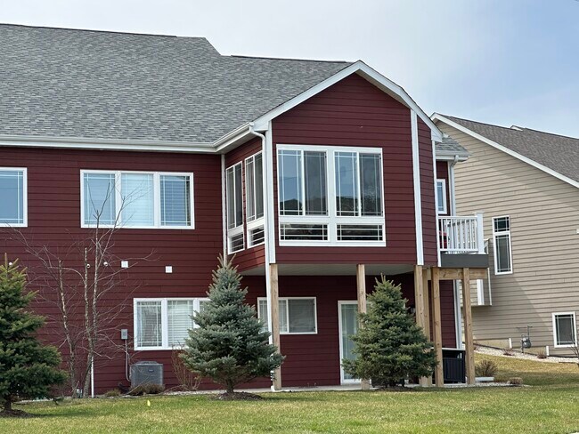View of sunroom and back deck. - 614 Goldeneye Cir