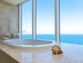 Building Photo - 17201 Collins Ave