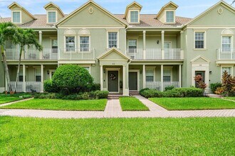 Building Photo - 212 W Thatch Palm Cir