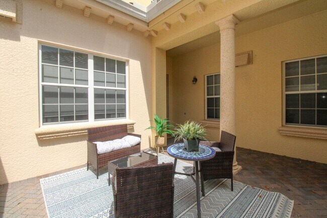 Building Photo - ** FIDDLER'S CREEK 3/3 WATERFRONT COACH HOME ** SOCIAL MEMBERSHIP TO FIDDLER'S CREEK **