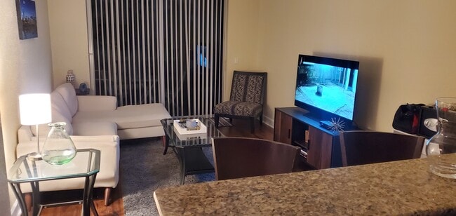 From kitchen and entrance to living room - 1660 Renaissance Commons Blvd