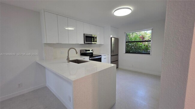 Building Photo - 10161 W Sunrise Blvd