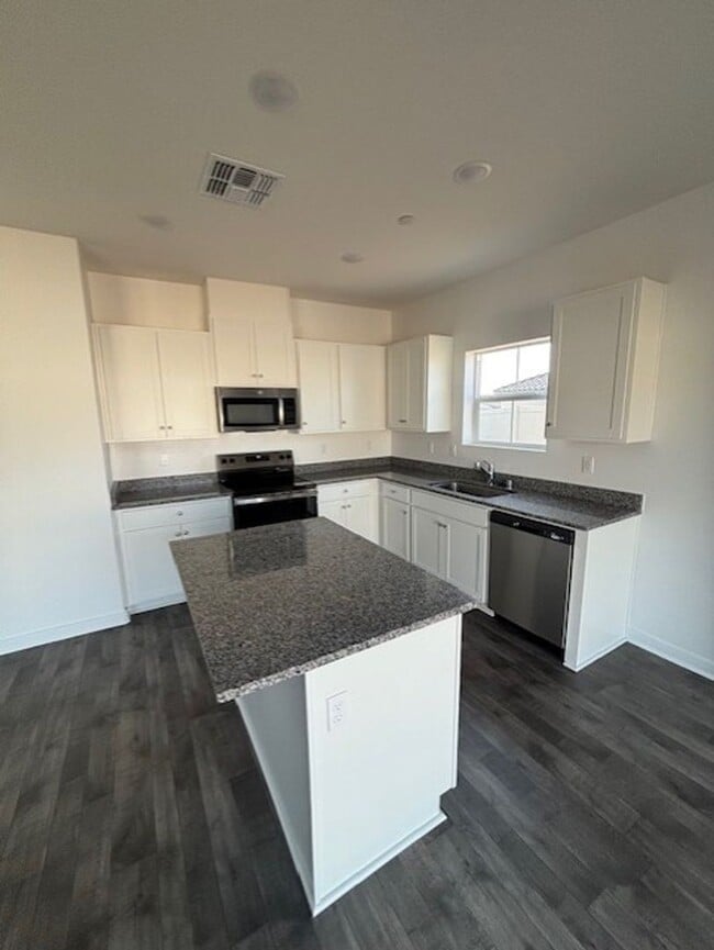 Building Photo - Move-In Ready Brand New 3 Bedroom Home with Paid Solar and 2-Car Garage