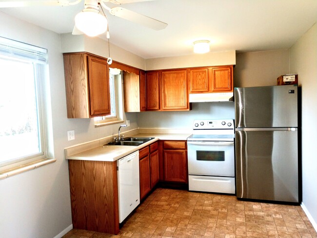 Bright eat-in kitchen. Space for a average table and chairs. - 1275 Moore St