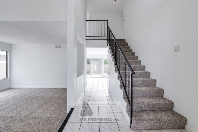 Building Photo - 5 Bedrooms. 3-Car Garage. Huntington Beach Charm!