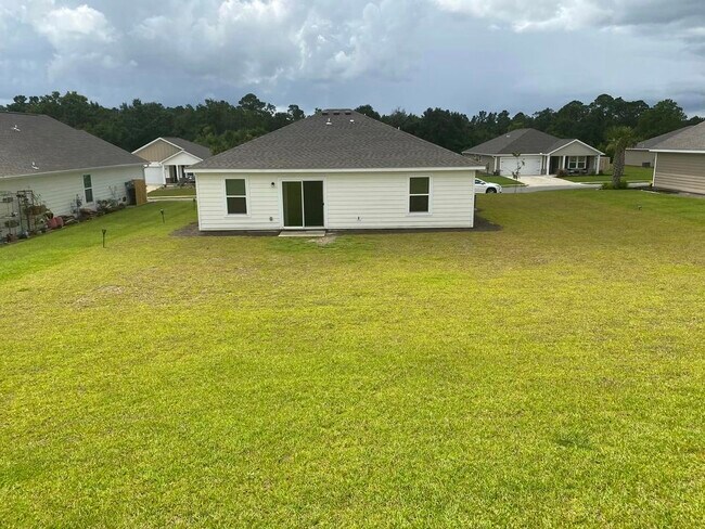 Foto del edificio - 619 Whispering Creek Ave