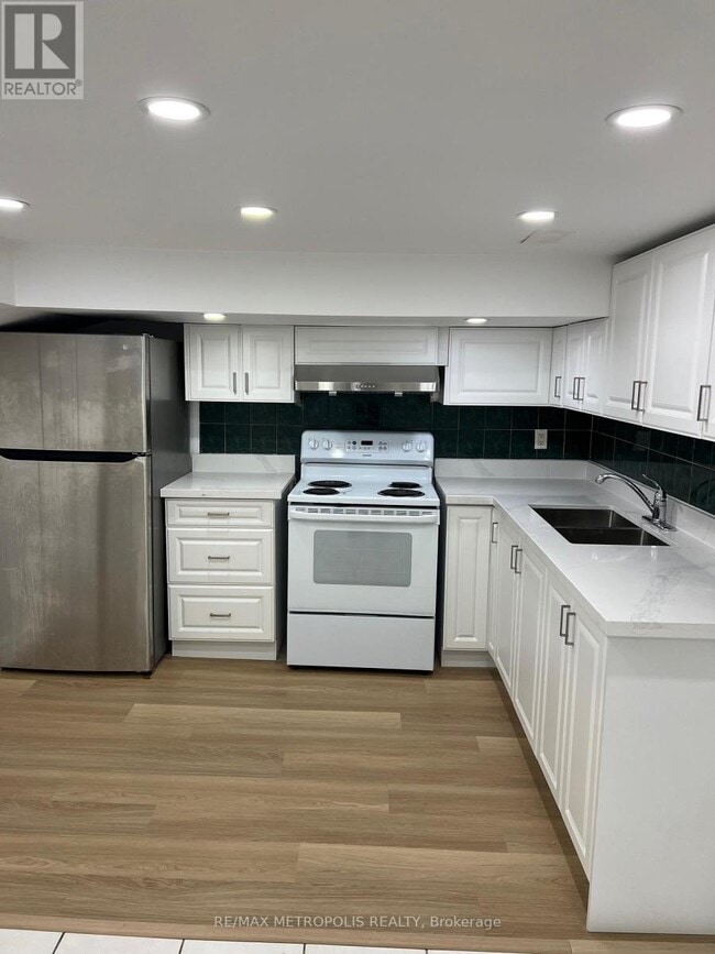 Building Photo - 3244 Lawrence Ave E