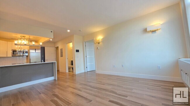 Building Photo - Sunlit 5th-Floor 1-Bed with a Showpiece Open Kitchen