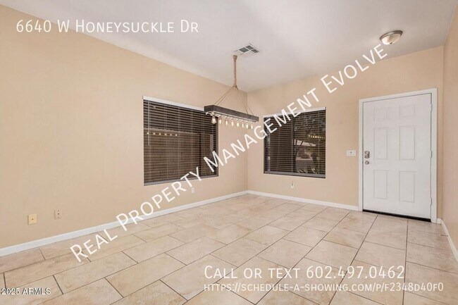 Foto del edificio - 6640 W Honeysuckle Dr