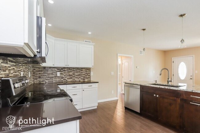 Building Photo - 3 br, 2 bath House - 2300 49Th Avenue W